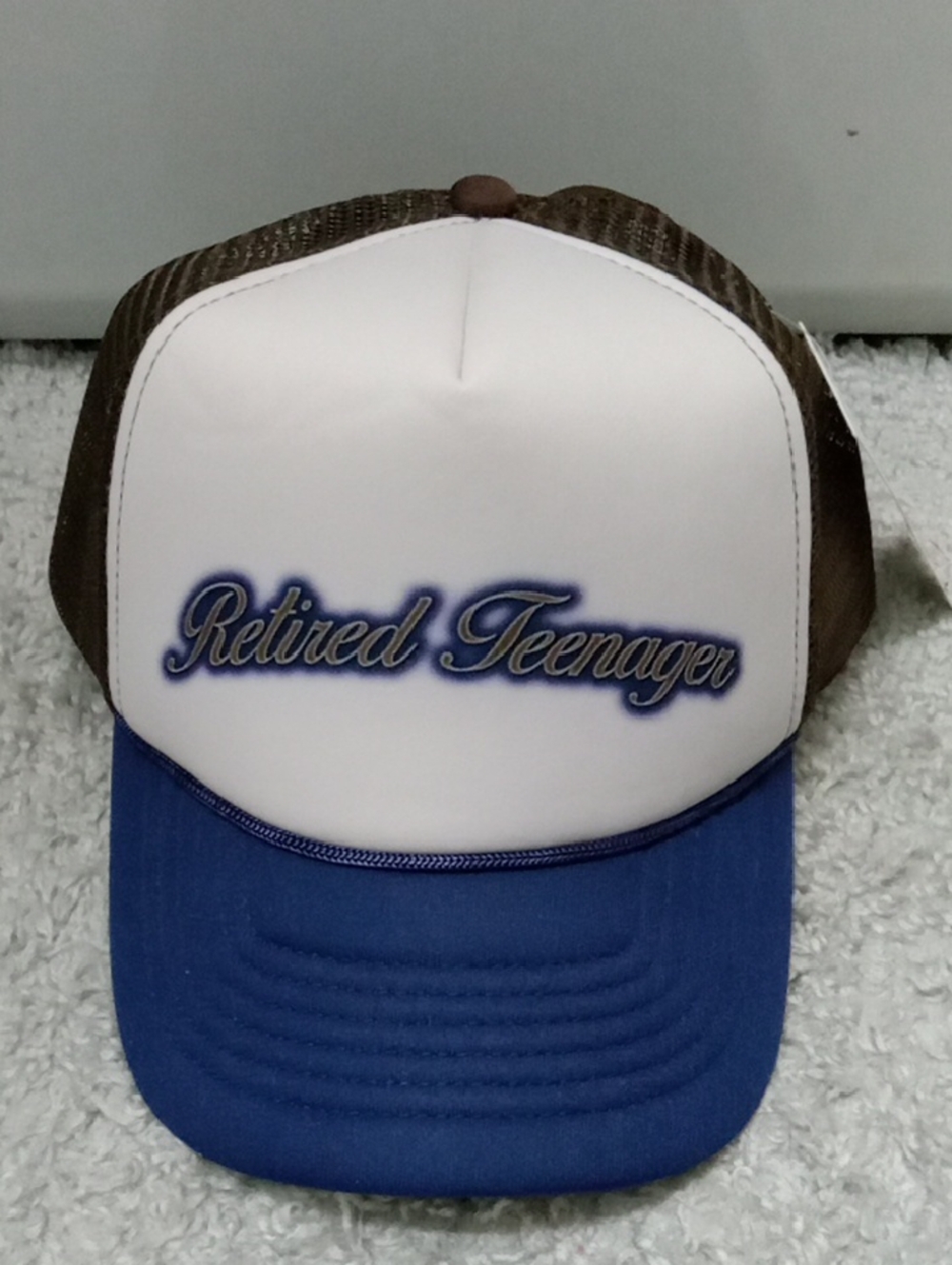 NWT UO Retired Teenager Trucker Hat